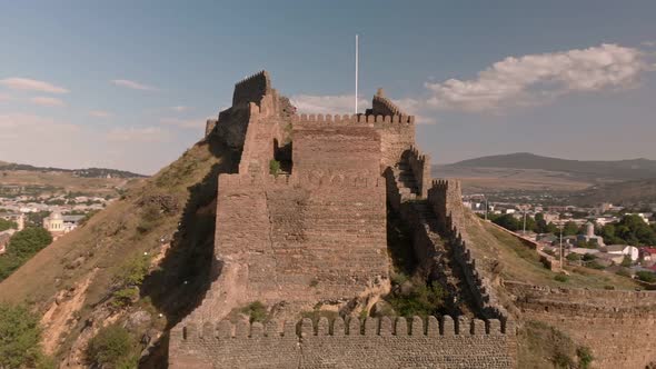 Georgian Flag Over Walls Of Gori Fortress