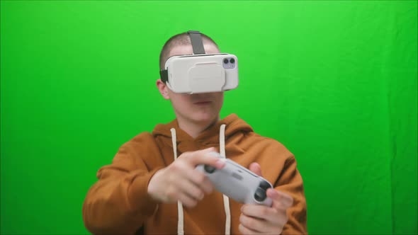 Portrait of Young Man Wearing Virtual Reality Glasses Playing Vr Video Games