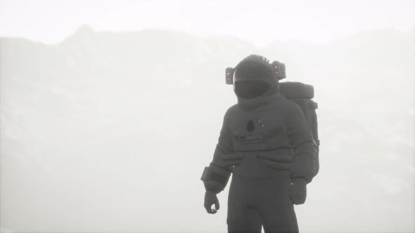 Astronaut on Another Planet with Dust and Fog