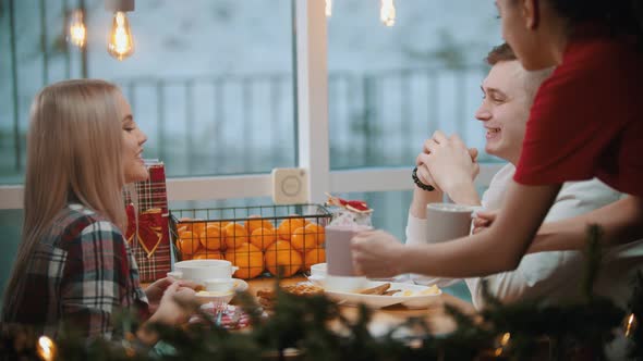 A Couple in Cafe Having a Lunch and Talking To Each Other - Waiter Brings Them Cups of Coffee