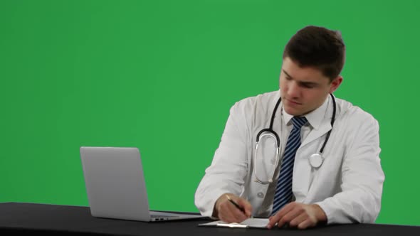 Young doctor in a lab coat