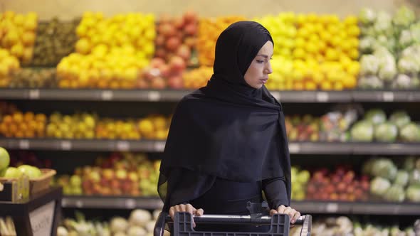 Portrait of a Muslim Woman Shopping for Groceries at Supermarket