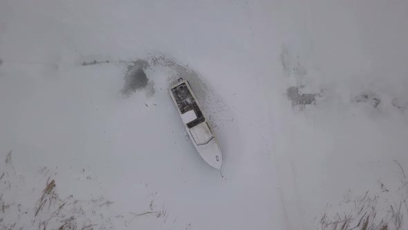 Boat On Iced River