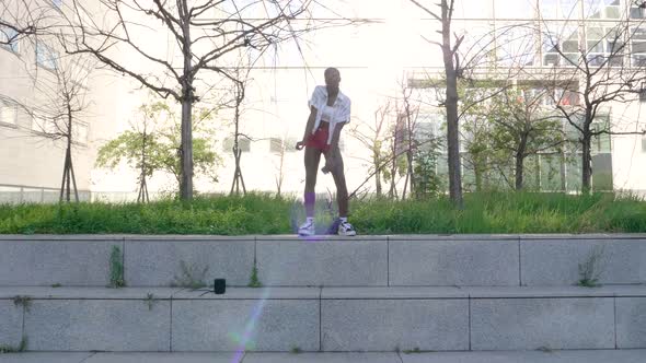 Slow motion shot of young woman dancing outdoors