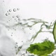 Person Throws Cucumber Lime and Mint Leaves Into Water - VideoHive Item for Sale