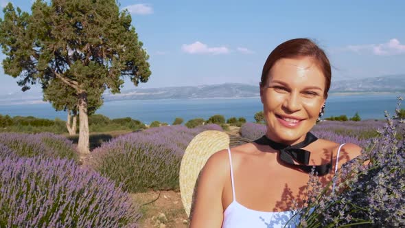 Happy Tourist Woman In Lavender Field