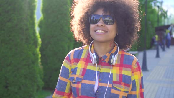 Portrait African American Woman Visually Impaired with an Afro Hairstyle