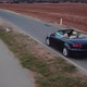 Aerial Shot Expensive Cabriolet Car Driving on Country Road Highway. Travel Concept, Car Rental - VideoHive Item for Sale