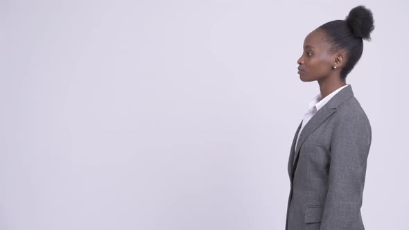 Profile View of Young Beautiful African Businesswoman Thinking