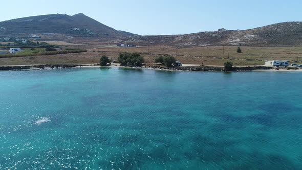 Piperi beach in Naoussa on Paros island in the Cyclades in Greece aerial view