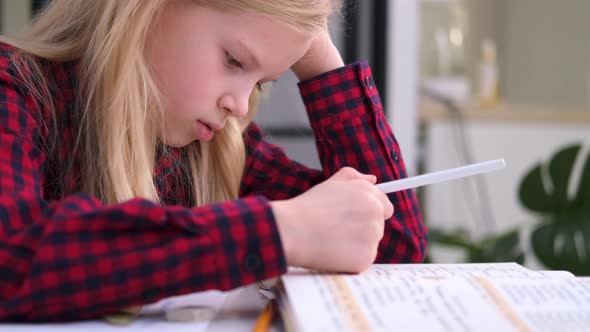 Blonde Schoolgirl Studying at Home Doing School Homework