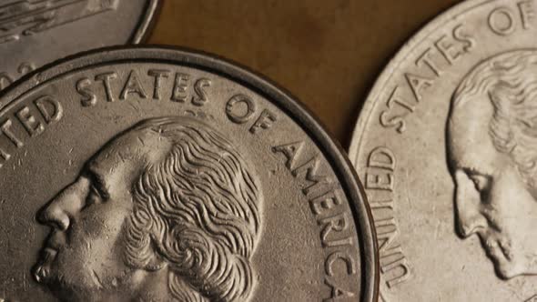 Rotating stock footage shot of American quarters