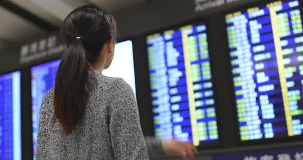 Woman go travel at Hong Kong airport 