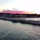 Cinematic pier in the sunset from a bird's eye view. Filming at sunset in Sopot. - VideoHive Item for Sale