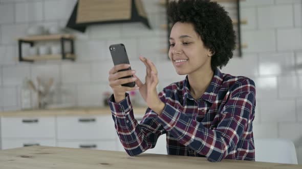 Young African American Woman Using Smartphone