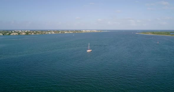 Aerial View of a Sail Boat on Calm Ocean Water