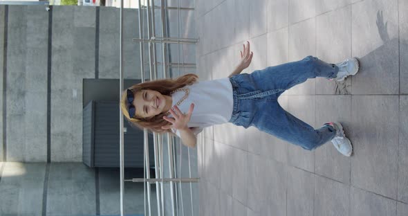 Cute Stylish Girl Dancing Street Hiphop in Front of Camera on Urban Area