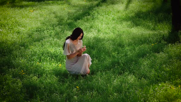 Woman Gathering Flowers