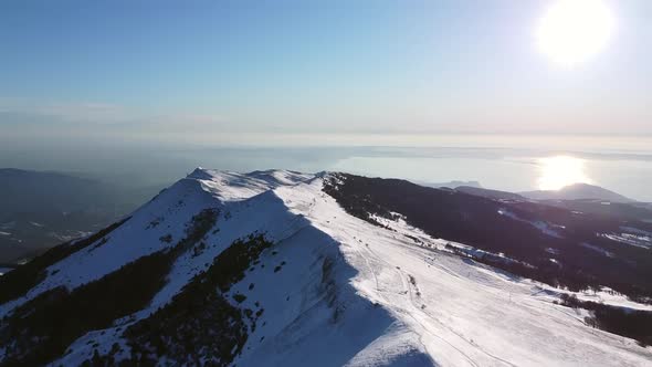 Flying over the Mountain Peaks and lake