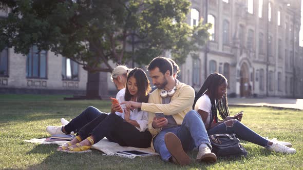 Young Students Spending Time on Campus Lawn