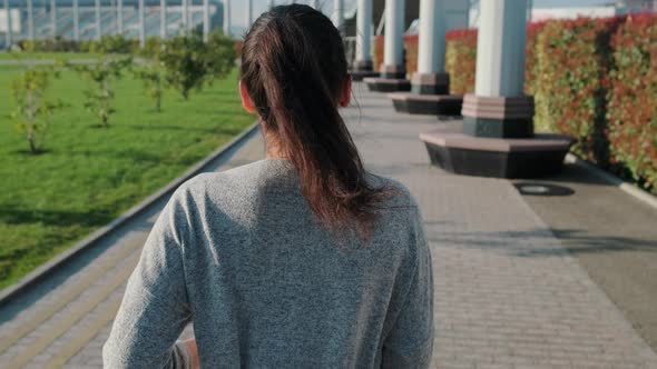 Girl Jogging in the City