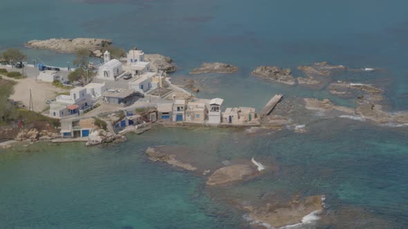 Slow Aerial Tilt Up of the Fishing Village of Mandrakia in the Island of Milos