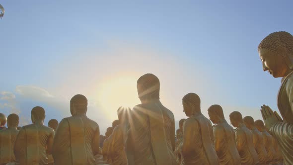 Light Shining Through A Buddha Statues