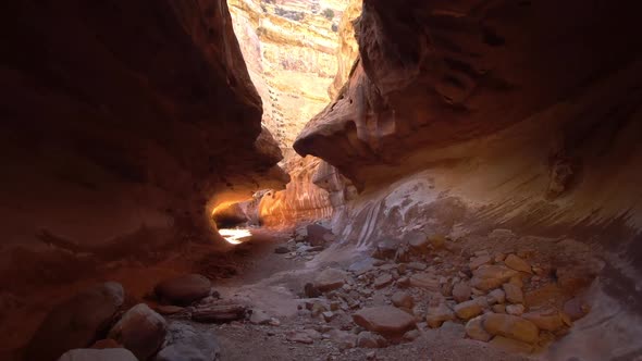 Hiking through slot canyon in the San Rafael Swell