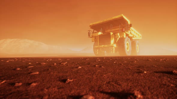 Big Yellow Mining Truck in the Dust at Career