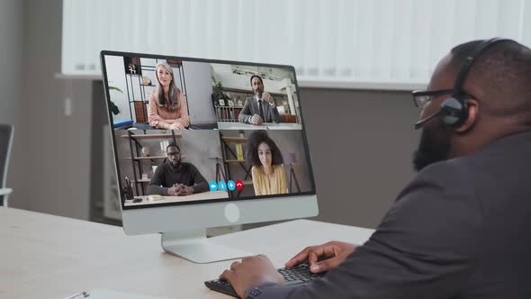 African American Businessman Having Online Business Meeting With Colleagues Making Video Call on the