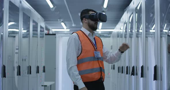 Electrical Worker Wearing a VR Headset