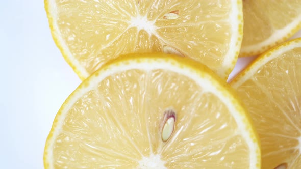 lemon close-up. rotating lemon slices close-up slow mo