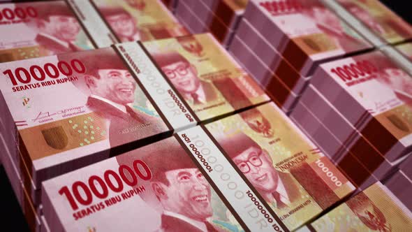 Indonesian Rupiah money banknotes pack seamless loop