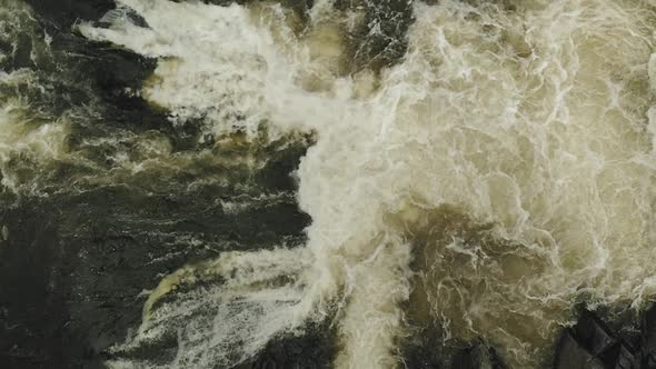 Hypnotic aerial birds eye view over Tobey Fall slow motion ascending 4K