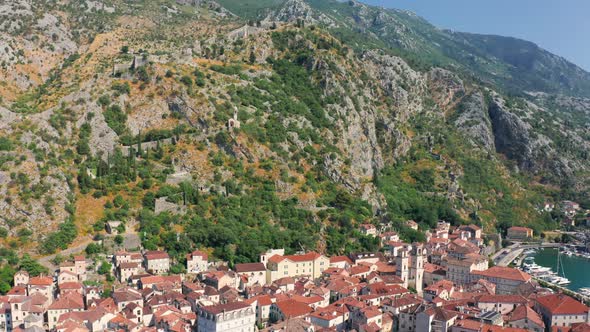 Aerial Top View on the Red Roofs in the Old Town of Kotor From Above in Montenegro