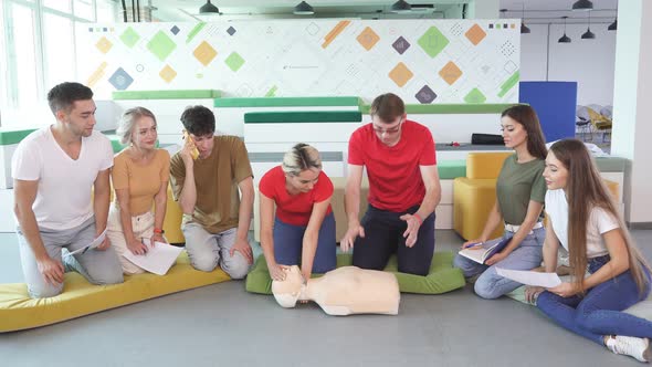 Caucasian People Practice an Exercise of Resuscitation During Lesson