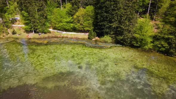 Beautiful small Lake in the Mountains Drone Video