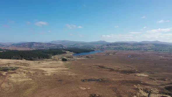 Aerial View of Peatbog and Lake Ananima Next to the Town Glenties in County Donegal  Ireland