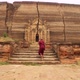 Asian Monk Walking In Front Of Burmese Ancient Buddhist Temple. Slow Motion Footage. Mandalay - VideoHive Item for Sale