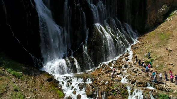 Tourism Waterfall With Tourists