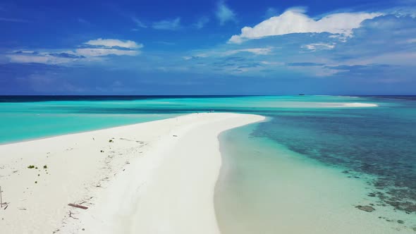 Aerial nature of paradise resort beach lifestyle by blue green ocean with white sand background of a