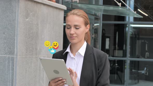 Walking Businesswoman Using Tablet, Flying Smileys, Emojis and Likes