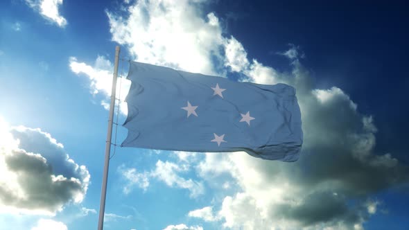 Federated State of Micronesia Flag Waving at Wind Against Beautiful Blue Sky