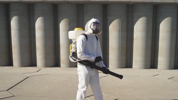 Cleaner Pressurized Sprayer Hands Going To Disinfect Public Places