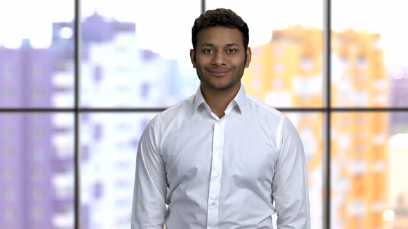 Portrait of a Young Happy Hindu Man Wearing White Formal Shirt