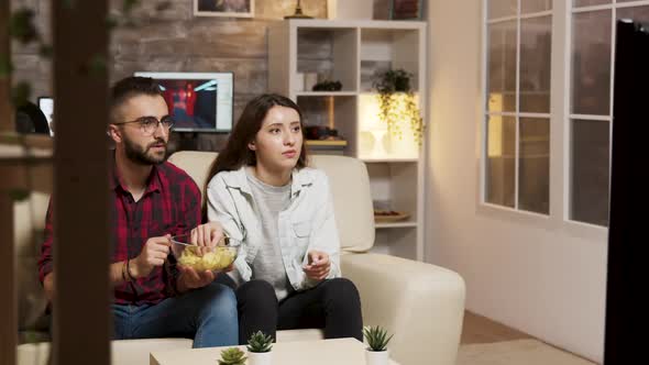 Boyfriend Covers Girlfriend Eyes While Watching a Horror Movie