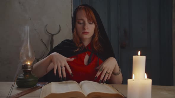 Portrait of Mysterious Sorceress with Magic Book