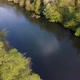 View of the river from above. Flight over water and forest trees from a height - VideoHive Item for Sale