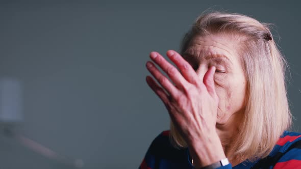 Disappointed Old Woman Reading Document