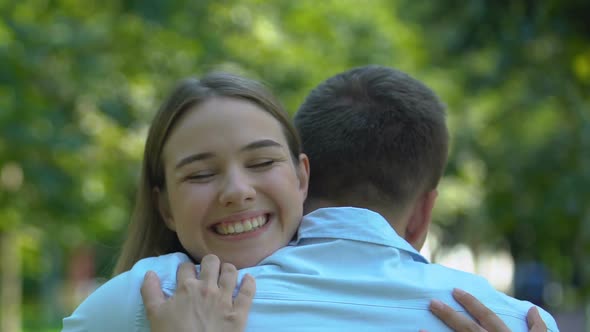 Smiling Girlfriend Tenderly Hugging Her Boyfriend, Date, Warm Relationships